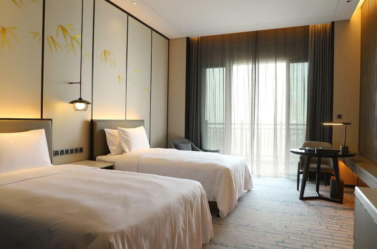 Wanda Realm Wuxi Hotel Bagian luar foto